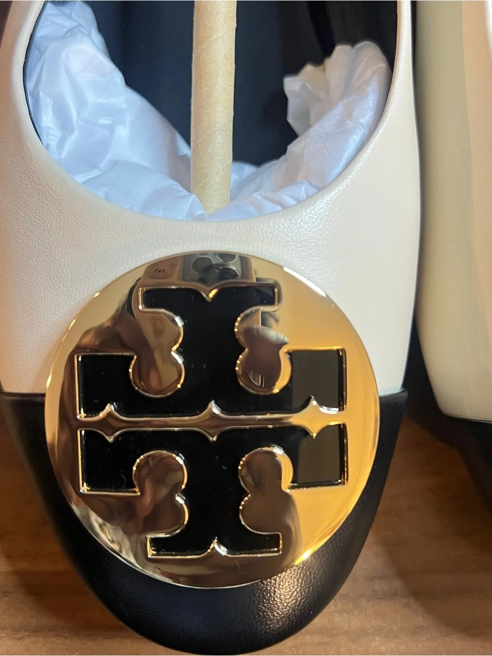 Tory Burch classic included